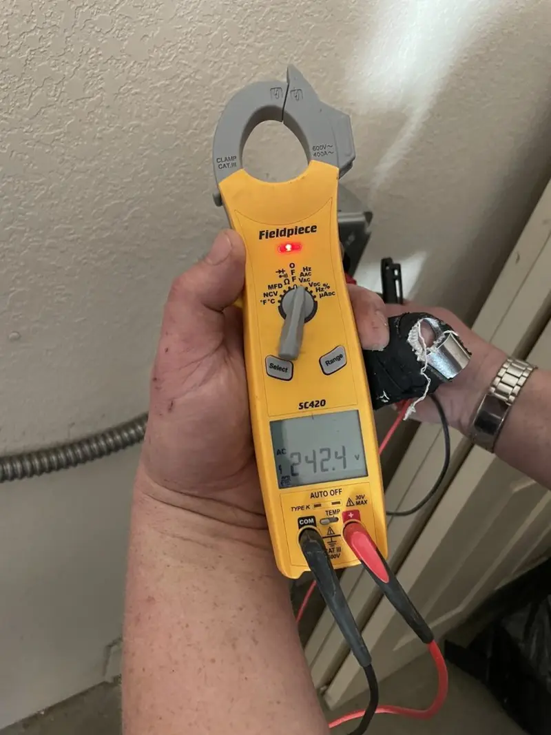Voltage testing with clamp meter during Recessed Lighting Installation in Northumberland